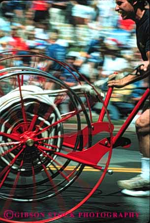 Stock Photo #4139: keywords - annual bencia blur california cart competition contest cooperate event firemens hose man men motion movement muster perform public race street summer team vert
