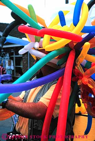 Stock Photo #4144: keywords -  balloon clothing color colorful cover hat head shade style vert