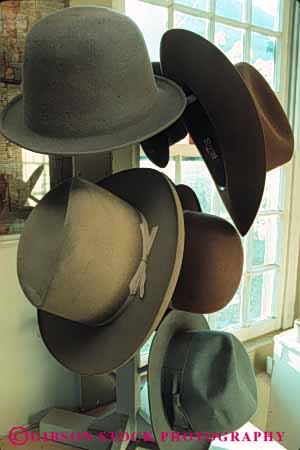 Stock Photo #4146: keywords -  american clothing cover early felt hat hats head rack shade style tradition vert