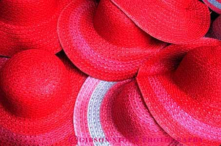 Stock Photo #4148: keywords -  abstract clothing color colorful cover hats head horz pattern pink red round shade straw style