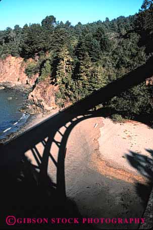 Stock Photo #4150: keywords - abstract arch bridge contrast curve dark highway light shadow silhouette vert