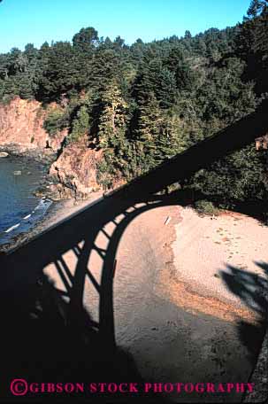 Stock Photo #4150: keywords -  abstract arch bridge contrast curve dark highway light shadow silhouette vert