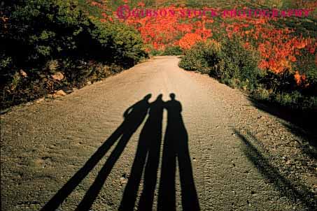 Stock Photo #4152: keywords - contrast dark horz light people shadow silhouette three
