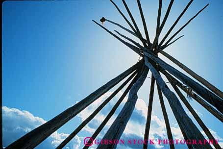 Stock Photo #4159: keywords - american cone geometric geometry historic home horz house indian native poles portable primitive pyramid residence shelter silhouette sun teepee tent tradition triangle west wood