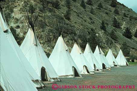 Stock Photo #4160: keywords -  american canvas cone geometric geometry historic home horz house indian lots many native oregon pattern patterns plains pole poles portable primitive pyramid repeat repeating repeats repetition replica replicas reservation residence row rows serial shape shaped shelter shelters springs symmetry teepee teepees tent tepee tepees tipi tipis tradition triangle triangles triangular trinagle umerous warm west white