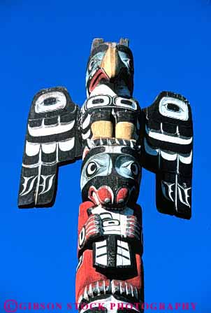 Stock Photo #4169: keywords -  american canada carve craft decorate indian native paint pole symbol totem vert victoria wood worship