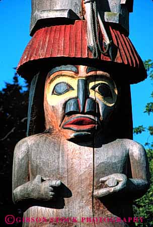 Stock Photo #4170: keywords - american canada carve craft decorate indian native paint pole symbol totem vert victoria wood worship