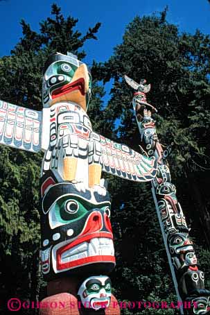 Stock Photo #4174: keywords - american canada carve craft decorate indian native paint park poles stanley symbol totem vancouver vert wood worship