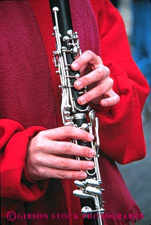 Stock Photo #4178: keywords -  band clarinet create equipment hand instrument metal music musical noise note perform practice show sound tool vert wind