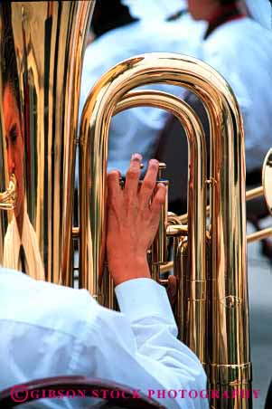 Stock Photo #4180: keywords -  band brass contour create curve equipment hand instrument metal music musical noise note perform practice shiny show sound tool tuba vert wind