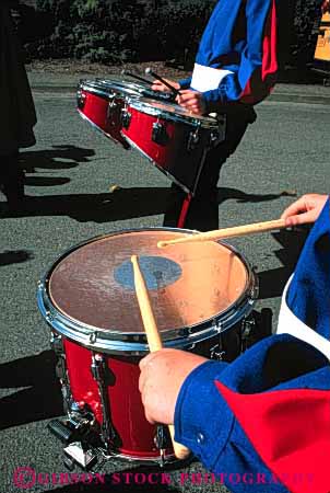 Stock Photo #4183: keywords - band create drum drummer drummers drumming drums equipment hand instrument instruments march marching music musical noise note parade parades percussion perform performance performer performers performing practice show snair sound stick sticks tool vert