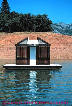 Stock Photo #4187: keywords -  boaters building california float floating for lake out outhouse raft restroom shack shasta toilet vert