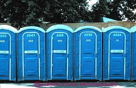 Stock Photo #4190: keywords -  blue building horz out outhouses plastic repeat repetition restroom row shack similar toilet