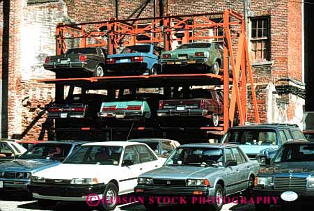 Stock Photo #4198: keywords -  car cars compress efficient elevated horz hydraulic lift lot park parking rack stack store