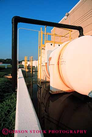 Stock Photo #4207: keywords - caution chemical chlorine clean equipment filter hazard industry machine plant plastic poison process public risk sanitation sewage storage tank toxic treatment utility vert waste water white