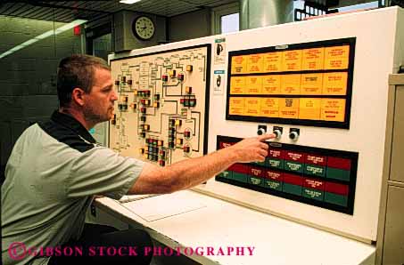 Stock Photo #4215: keywords -  chemistry clean employee equipment filter horz industry job labor laboratory machine monitor occupation plant process public record released sanitation science sewage technician test treatment utility waste water