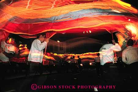 Stock Photo #4223: keywords - annual asian blur blurred blurs california celebrate celebration chinese color colorful cultural culture display ethnic event events fair fairs festival festivals francisco heritage holiday horz light lighting lights minority motion movement moves moving new night parade parades people perform person san show streak streaked streaking streaks together unity year years