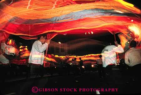 Stock Photo #4223: keywords -  annual asian blur blurred blurs california celebrate celebration chinese color colorful cultural culture display ethnic event events fair fairs festival festivals francisco heritage holiday horz light lighting lights minority motion movement moves moving new night parade parades people perform person san show streak streaked streaking streaks together unity year years