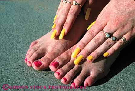 Stock Photo #4231: keywords - appearance beauty body bright color cosmetic feet hand horz looks nail polish red skin teenage teenager toenail woman yellow young