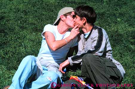 Stock Photo #6151: keywords -  affection attraction commitment controversial controversy couple embrace gay homo homosexual homosexuality horz immoral kiss lesbian love pair people released romance romantic same sex sexual sexuality sexy together two