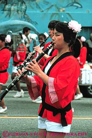 Stock Photo #4238: keywords -  annual asian blossom celebrate celebration cherry clarinet color colorful dance display ethnic event festival francisco japanese minority music parade performance san show together unity vert woman