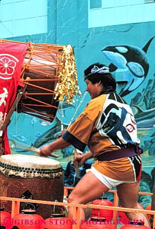 Stock Photo #4242: keywords - annual asian blossom celebrate celebration cherry color colorful costume dance display drums ethnic event festival francisco japanese man minority music parade percussion performance san show together unity vert