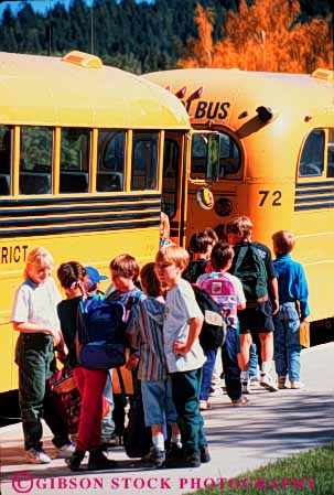 Stock Photo #4267: keywords -  adolescent board boy boys bus child children class educate education elementary forth fourth girl girls grade group kid kids learn line school students together transportation vert wait yellow young youth