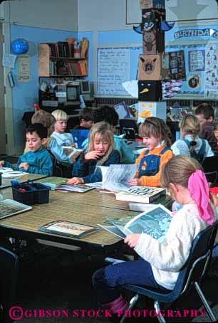 Stock Photo #4272: keywords -  adolescent boy boys child children class classroom educate education elementary girl girls grade group kid kids learn quiet read school second students study studying studys together vert young youth