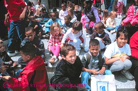 Stock Photo #4277: keywords -  adolescent african american boy boys child children class educate education elementary ethnic field girl girls grade group horz kid kids learn minority mix race school second students study together trip young youth