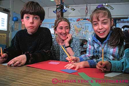 Stock Photo #4279: keywords -  adolescent boy child children class classroom educate education elementary girl grade group horz kid kids laugh learn school students study third together young youth