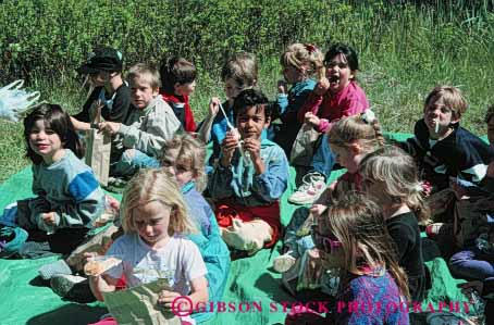 Stock Photo #4283: keywords - adolescent boy boys child children class educate education elementary ethnic field girl girls grade group horz kid kids learn minority mix outdoor race school second students study summer together trip young youth