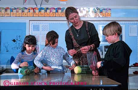 Stock Photo #4284: keywords - adolescent art boy child children class classroom craft crafts create educate education elementary girl girls grade group horz instruct job kid kids learn project released school students study teacher teaching third together woman young youth