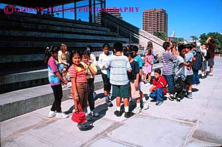 Stock Photo #4291: keywords -  adolescent african american black boy boys child children class educate education elementary ethnic field girl girls grade group hispanic horz kid kids learn minority mix race school students study third together trip young youth