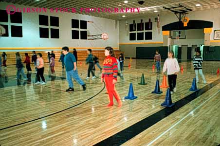 Stock Photo #4292: keywords -  adolescent boy boys child children class educate education elementary exercise forth fourth girl girls grade group gym horz kid kids learn movement physical released school students study together train training young youth