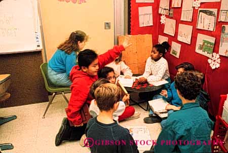 Stock Photo #4293: keywords -  adolescent african american asian black boy boys child children class classroom educate education elementary ethnic forth fourth girl girls grade group horz kid kids learn minority mix race released school students study team together young youth