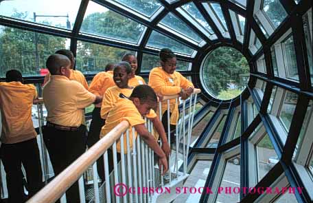 Stock Photo #4295: keywords - adolescent african american black boy boys child children class educate education elementary ethnic exploris field forth fourth girl girls grade group horz kid kids learn minority nc race raleigh school shirt students study together trip uniform window yellow young youth