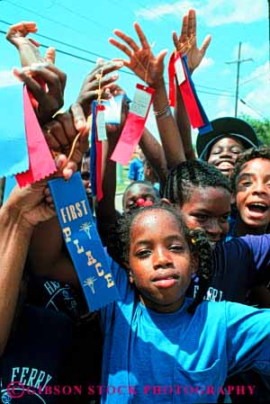 Stock Photo #4303: keywords -  adolescent african american awards black boy boys child children class contest educate education elementary ethnic forth girl girls grade group happy learn minority proud race ribbon ribbons school students summer together vert winner winners young youth