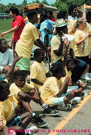 Stock Photo #4304: keywords -  adolescent african american black boy boys child children class educate education elementary ethnic field girl girls grade group learn minority race school sixth students summer together trip uniform vert yellow young youth