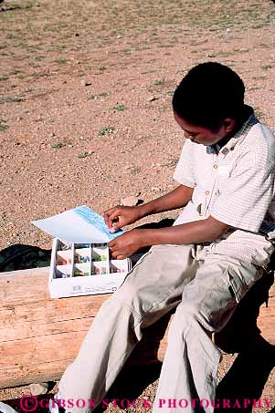 Stock Photo #14326: keywords -  adolescent adolescents african along american art artistic black boy chalk child children class draw drawing draws ethnic isolate isolated middle minority outdoor outside paper people school schools solitary solitude student summer teen teenage teenagers teens vert young youth