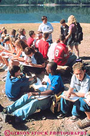 Stock Photo #14331: keywords -  adolescent adolescents african american boy child children class classes ethnic field gender group groups middle minority mixed outdoor outside paper people report reports school schools student students summer teen teenage teenagers teens trip trips vert write writes writing young youth