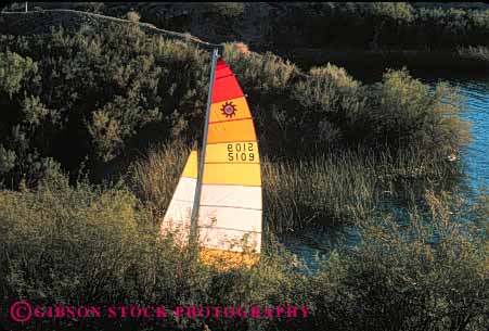 Stock Photo #4344: keywords -  alone boat boating bright contract craft float havasu hidden horz isolate isolated lake recreation sail shore toy triangle vessel water