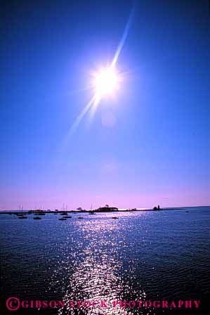 Stock Photo #4351: keywords -  boating boats bright craft dawn float harbor mood moody recreation reflection scenic seascape sun vert vessel water