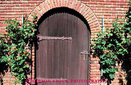 Stock Photo #4375: keywords -  arch architecture brick custom design door doorway entrance entry frame front horz old pattern rose traditional wood