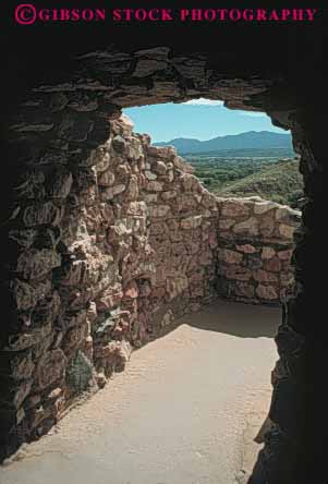 Stock Photo #4385: keywords -  architecture custom design door doorway entrance entry frame front hall masonry rock stone tunnel vert