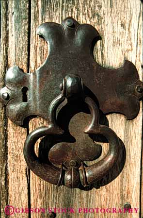 Stock Photo #4388: keywords - architecture custom design door doorway entrance entry frame heavy historic ines iron knocker metal mission old pattern santa spanish tradition traditional vert wood
