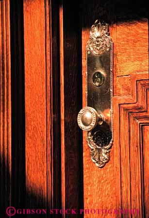 Stock Photo #4390: keywords -  architecture custom design door doorway entrance entry expensive finish frame front handle home knob lock luxury pattern texture vert wood