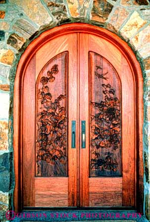 Stock Photo #4391: keywords -  arch architecture carve carved craft custom design door doorway entrance entry finish frame front home pattern texture vert wood