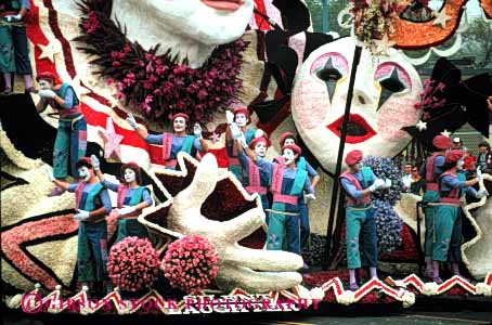 Stock Photo #4404: keywords - actor actress annual california celebrate colorful colors create creative design display event famous festival float floats floral flower flowers horz move of parade parades pasadena perform rose roses shoe spectacle spectacular tournament