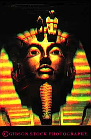 Stock Photo #4407: keywords -  artificial color dimension dimensional egypt face fake head hologram illusion image light pharaoh science symbol technology three unreal vert