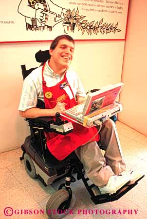 Stock Photo #4430: keywords - cerebral challenge challenged computer disability disabled disadvantage disadvantaged handicap handicapped impair impaired man motorized need needs palsy special vert wheelchair